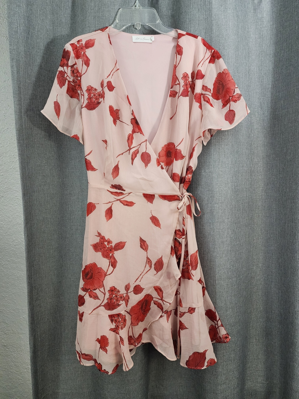 All in Favor Pink Wrap Dress with Red Floral Print